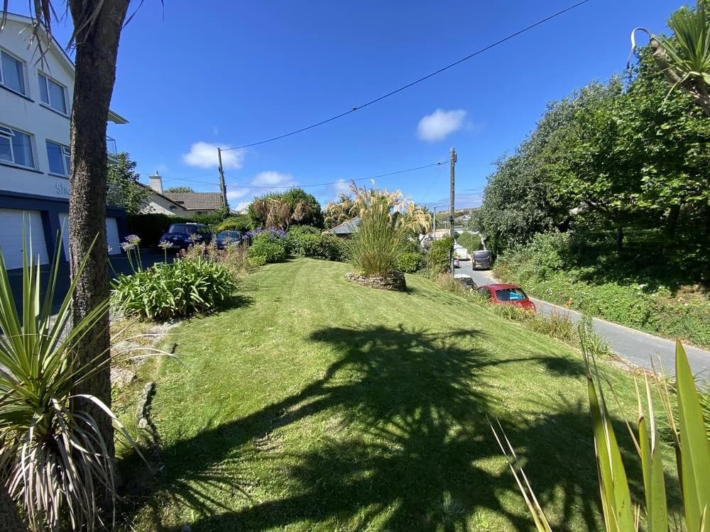 Perfectly manicured lawn with rich green grass and a fresh-cut finish