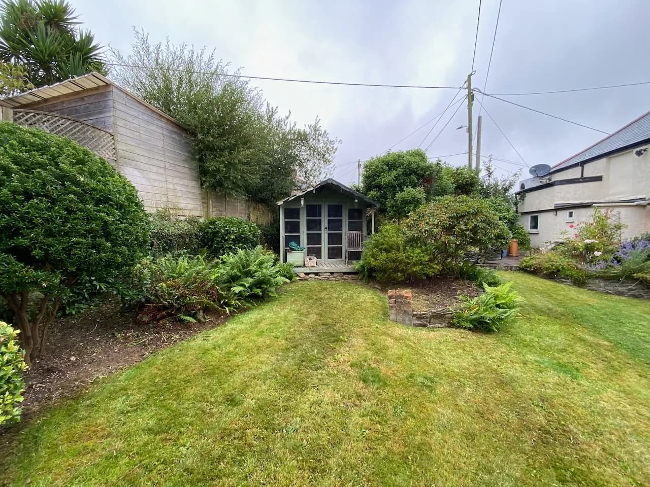 Clean garden with shed